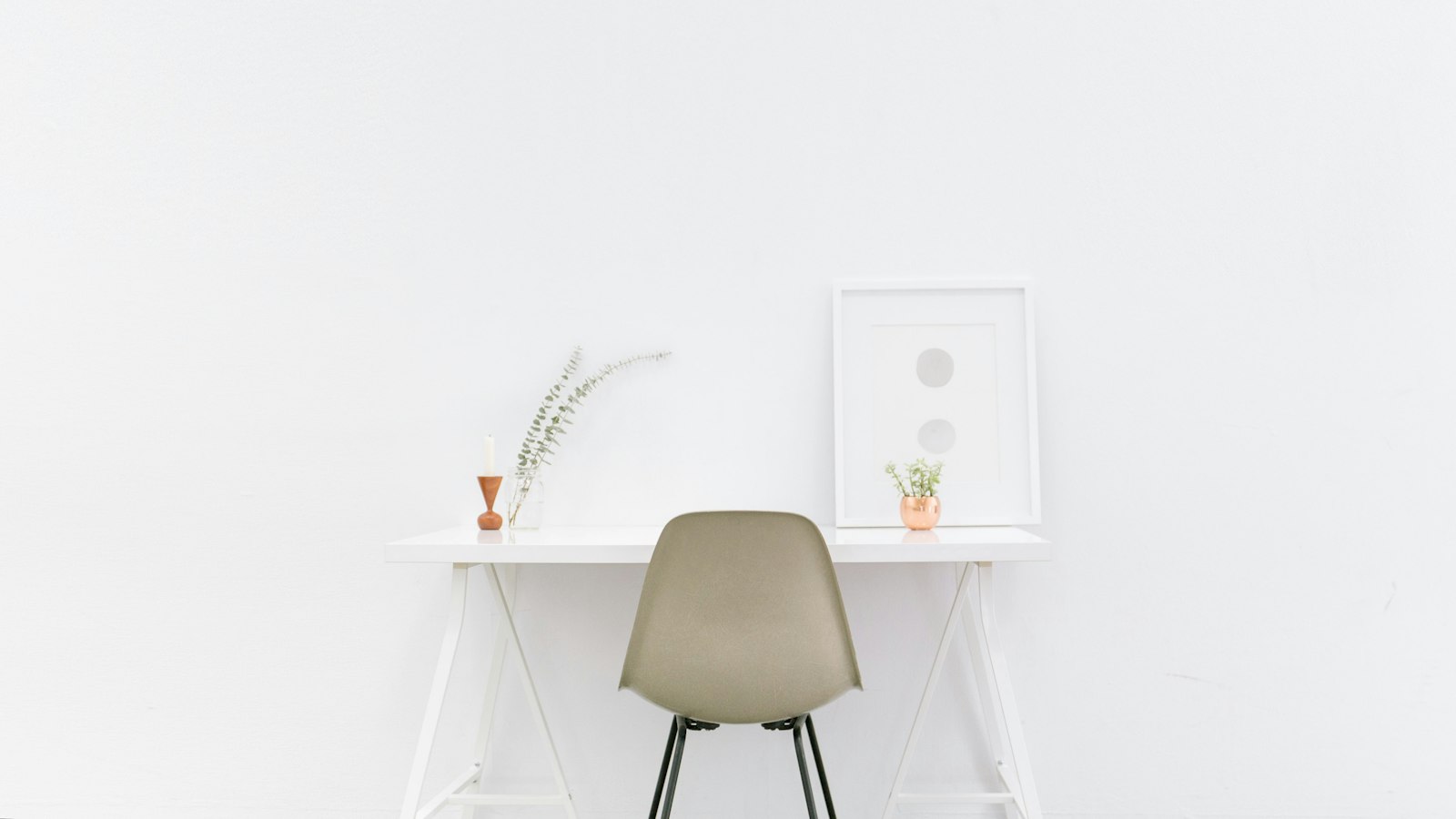 white wooden table near brown chair