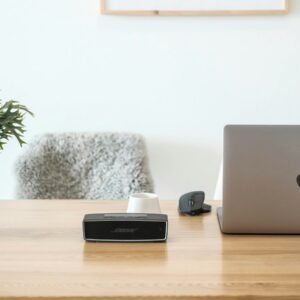 macbook pro on brown wooden table