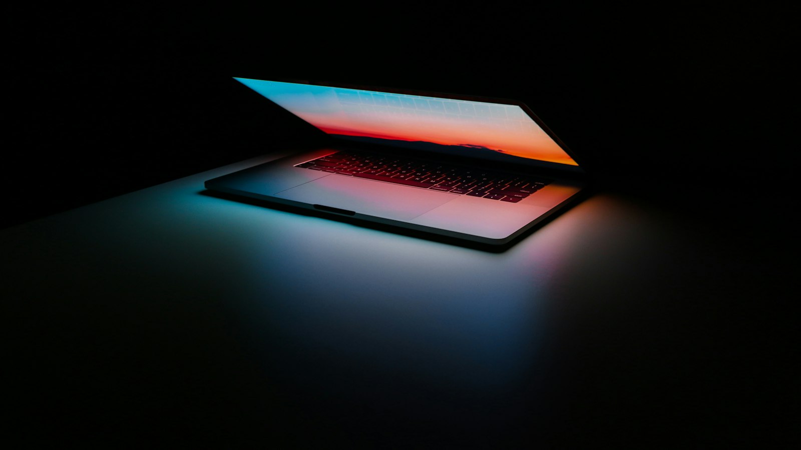 gray and black laptop computer on surface
