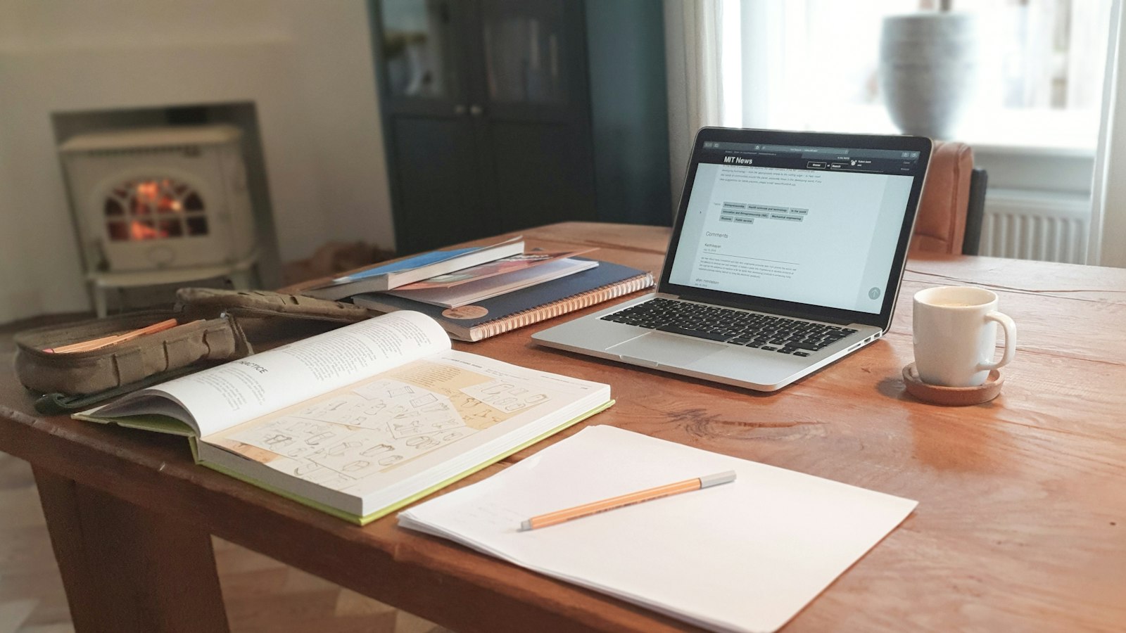 macbook air on brown wooden table