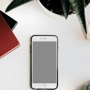 photo of iPhone on white surface