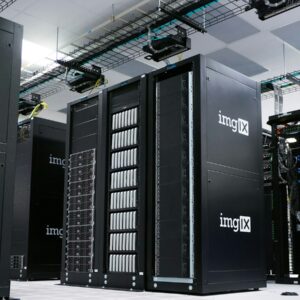 Rows of black server racks with white logos in a data center