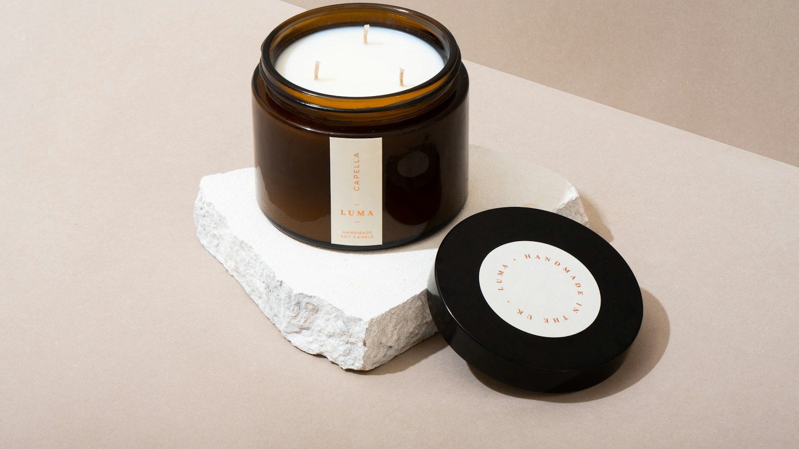 black round container on white tissue paper
