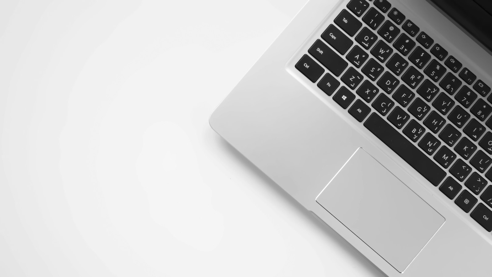 MacBook Pro on white surface