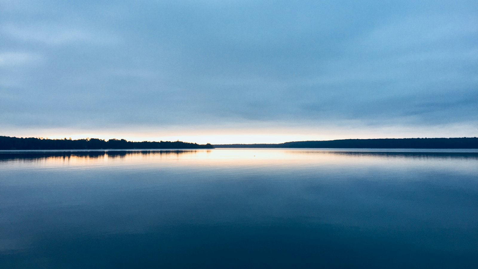 wide lake over sunset view