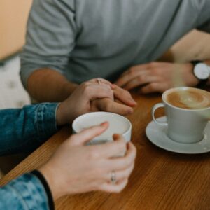 two mugs with coffee on table