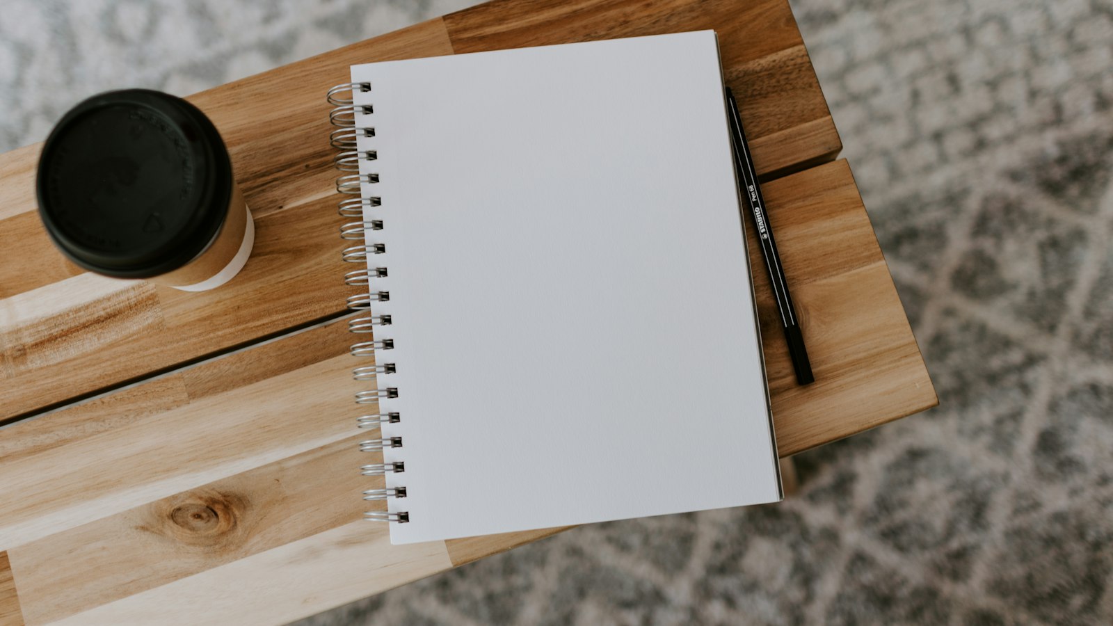 white printer paper on brown wooden table