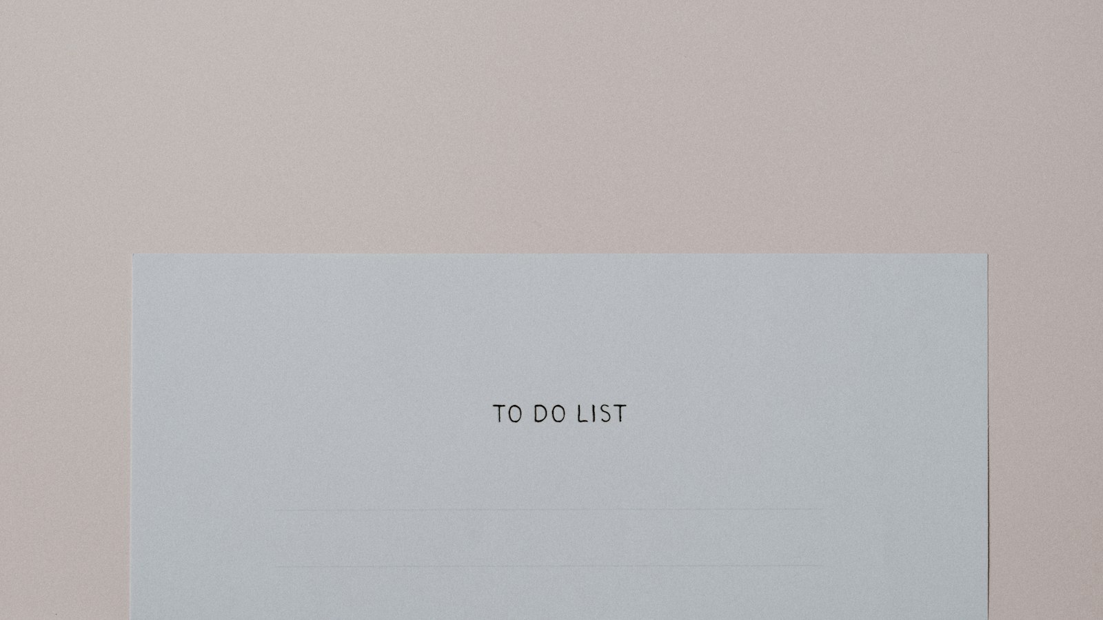 a piece of paper with the words to do list on it