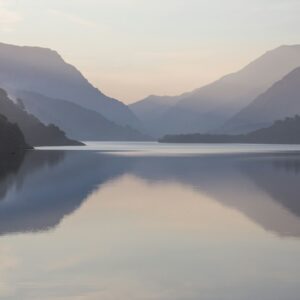 mountain near body of water during daytime