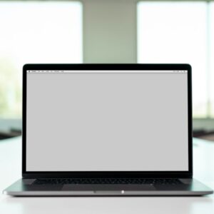 macbook pro on white table