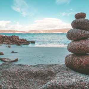 gray rocks on seashore during daytime