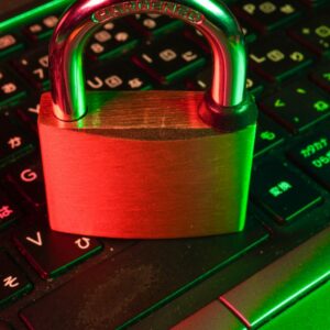 red padlock on black computer keyboard